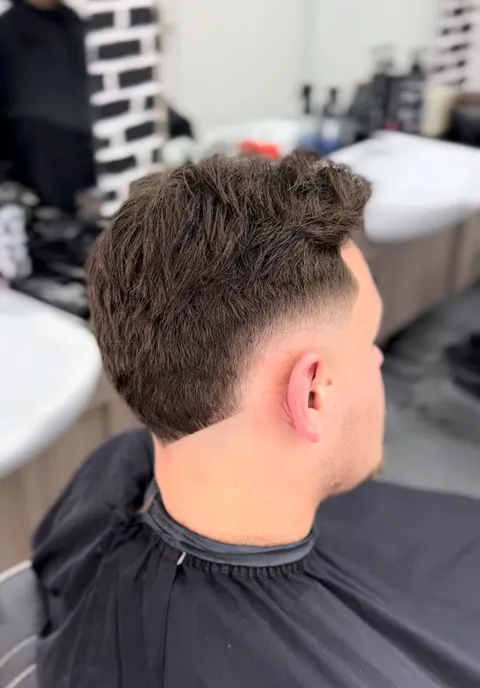 Bild 5 von 10 in der Galerie von "Coiffeur Dreispitz"