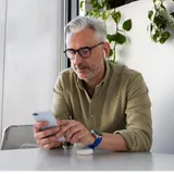 Mature man with phone