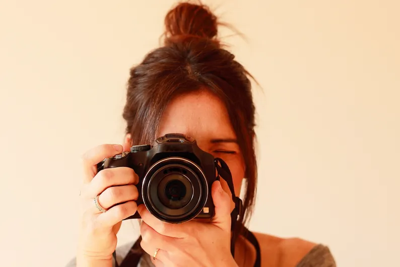 Фотограф за роботою