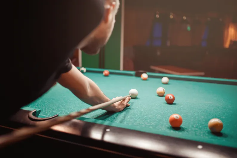 Playing billiards