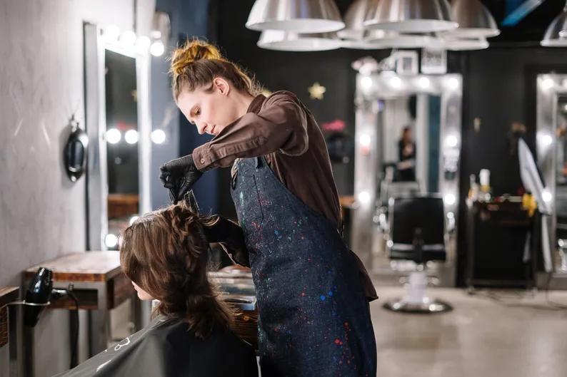 A hairdresser with a client