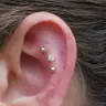 PIERCING ORELHA: Contra Concha (Contra Conch)