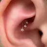 PIERCING ORELHA: Torre Escondida (Hidden Rook)
