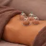 Масаж живота баночний