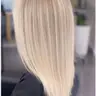 Total blonde (фарбування кореня +тонування довжини).