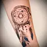 Mittelgroßes Tattoo